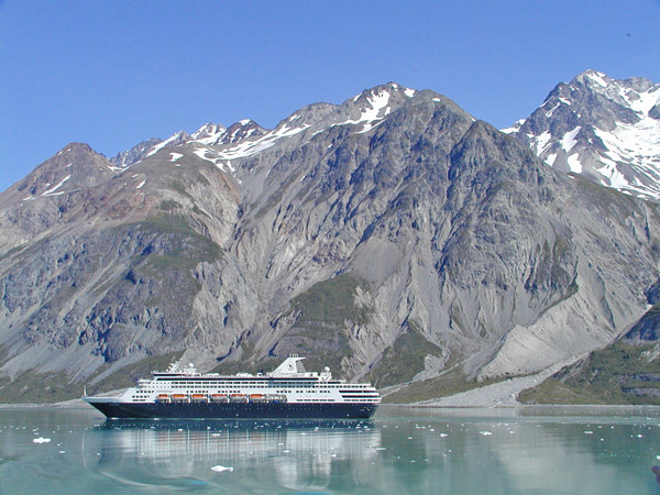 Cruise ship in front of mountain